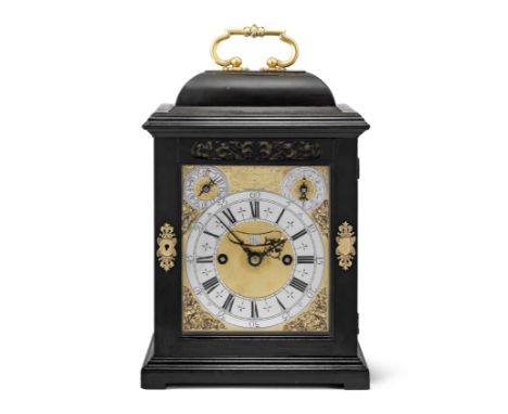 A fine and rare early 18th century gilt-metal mounted, ebony-veneered quarter-repeating and striking table clock of small siz