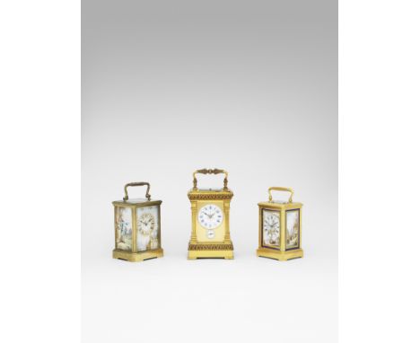A late 19th century French carriage clock with three enamel panelsThe case with moulded handle over an oval bevelled glass in