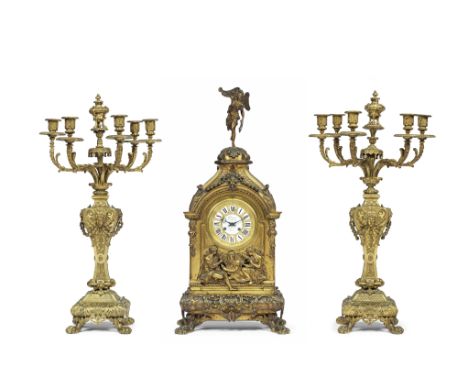 A Large and impressive Second Half of the 19th Century French Brass Mantel Clock with two Associated CandelabraDeniere, Ft. D