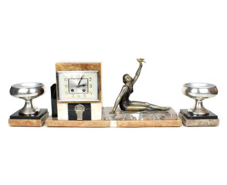 Art Deco Marble Mantel Clock and Garniture Circa 1920s-30s, bearing bronzed and silvered spelter figural surmount, the rectan