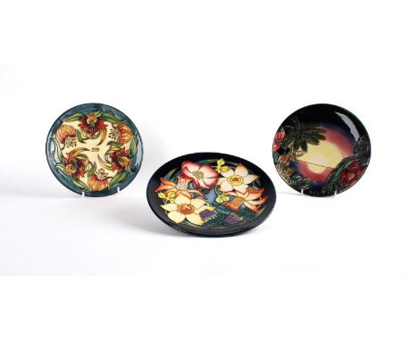 Moorcroft "Tiger Lily", "Golden Jubilee" and "Birth of Light (2000)" Plates All boxed, together with a Poole Pottery "Wild Po