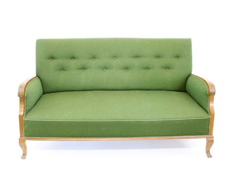 Danish Teak Framed Sofa Circa 1970s, the swept arms with carved foliate detail, raised on cabriole front supports and upholst