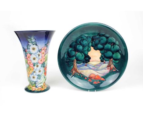 Moorcroft Trumpet Vase and Landscape Plate Both tubeline decorated on blue and green grounds respectively, with WM monograms 