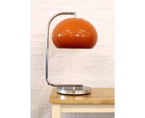Italian Table Lamp in the Style of Harvey Guzzini Circa 1970s, with burnt orange acrylic shade suspended on chrome plated fra