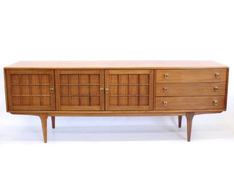 Herbert Gibbs for A. Younger Long Sideboard Circa 1960s, with three lattice-panelled cupboard doors enclosing a single shelf 