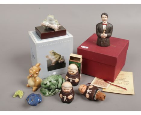 A mixed group of ceramics to include boxed Lladro frog, boxed Bronte porcelain Eric Knowles candle snuffer, Wade, Goebel etc.