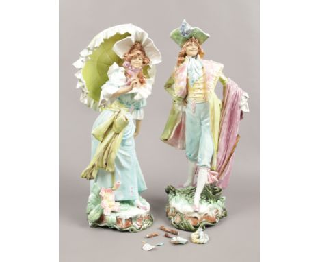 A pair of continental ceramic figures, depicting a courting couple in period dress.Condition report intended as a guide only.