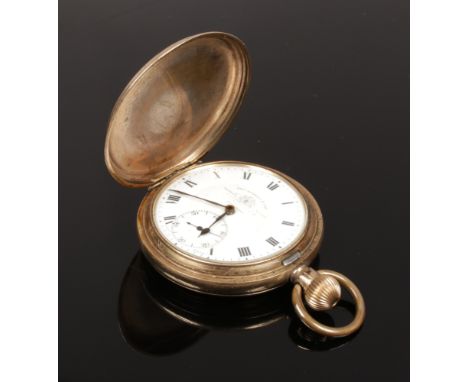 A yellow metal Thomas Russell &amp; Son full hunter pocket watch with white enamel dial, Roman numeral markers and subsidiary