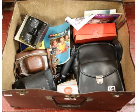 A box of photographic equipment to include Yashica Electro 35 camera, Kodak camera, Kodak Polaroid, flash unit etc.