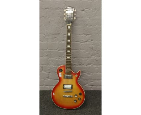 An Eros electrical guitar copy of Gibson Les Paul with a sunburst finish.Condition report intended as a guide only.Minor atte