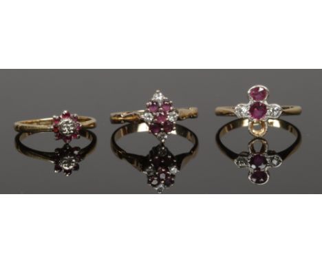 Three gold ruby and diamond rings, two stamped 18ct, one missing a stone.