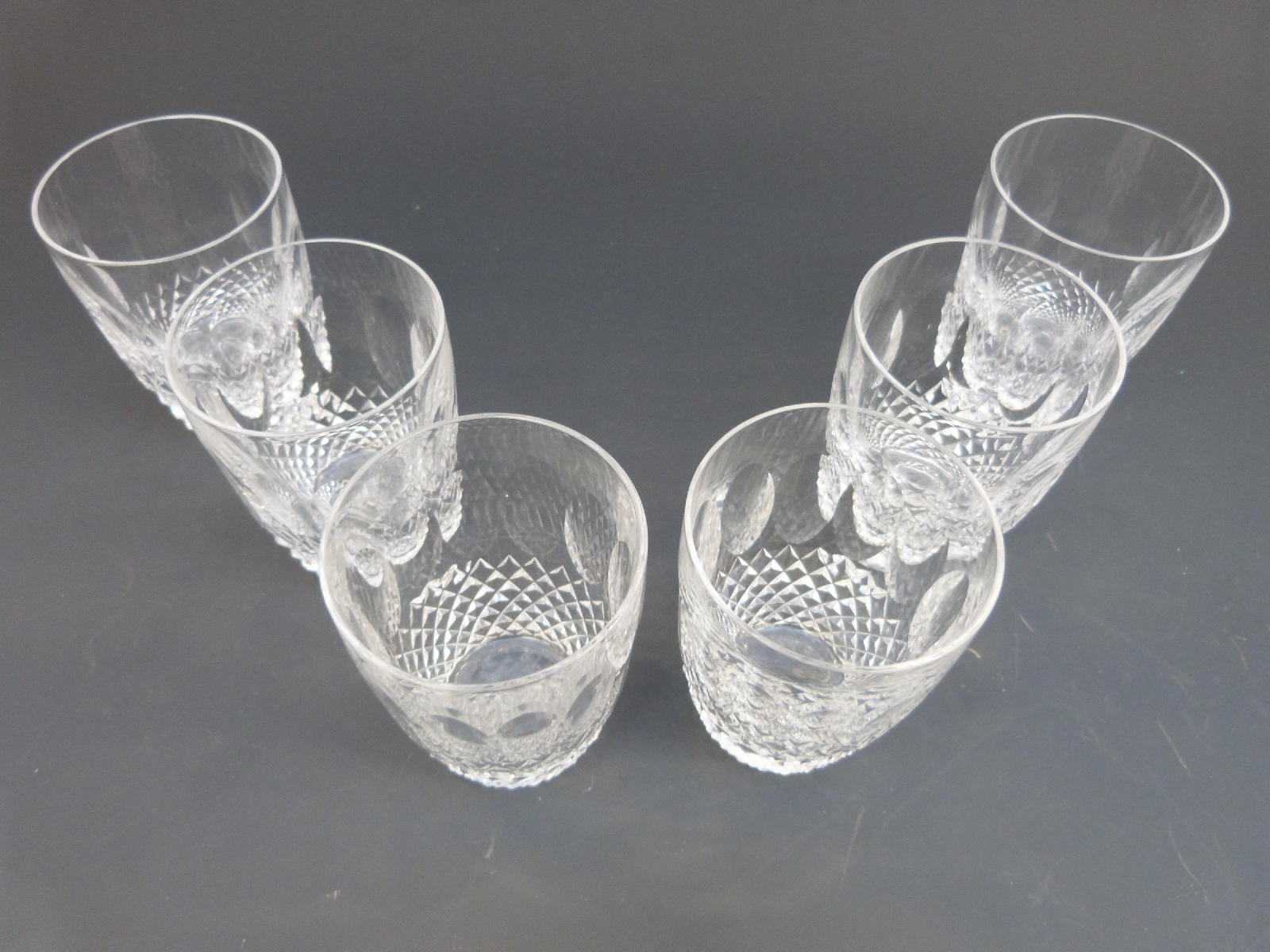 A set of six Waterford Crystal Colleen pattern tumbler glasses, 9cm tall.