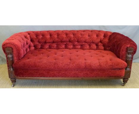 A Victorian mahogany Chesterfield sofa with carved and reeded frame, length 192cm