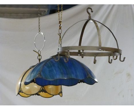 Two glass lamp shades, one blue/green the other butterscotch/ivory together with a metal pan hanger, larger diameter 48cm