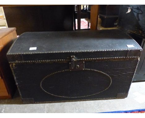 A 19th/20thC dome topped stud work trunk, H45 x W77 x D47cm