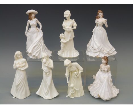 Seven Royal Worcester figurines including three from the Golden Moments Series and the First Kiss, First Steps, Christening e