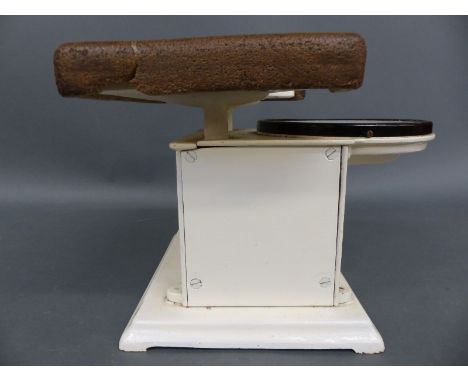 A set of c1930 bathroom scales with enamelled circular dial, height 23cm