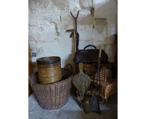 Wicker log basket, wicker metal bound stick stand with sticks, fireside implements, bellows, further wicker baskets and a lea