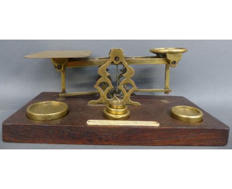 A set of S Mordan & Co, London postal scales, London, with weights, length 25.5cm