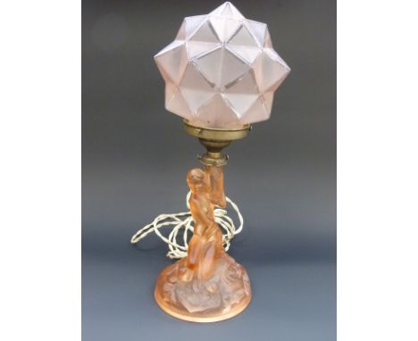 Czech Art Deco glass figural lamp in the form of a couching female nude with geometric shade, 42cm tall. 