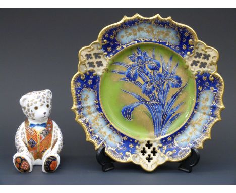 A Royal Crown Derby teddy bear paperweight (12cm tall) and a pierced Carltonware cabinet plate decorated with iris (24cm in d