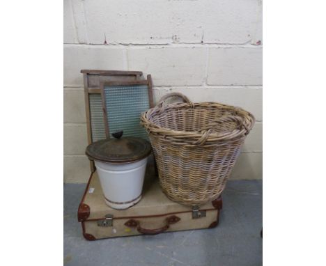 A large wicker log basket, enamel bucket and a suitcase 