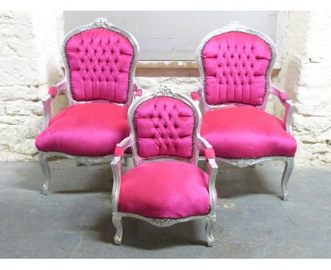 A pair of silvered French style armchairs with pink velour button backs and a matching child's example
