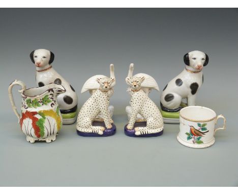 A collection of ceramics including a pair of blanc de chine heron spill vases, Prattware etc, 20cm tall
