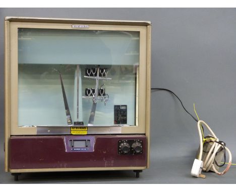 A cased set of Oertling jeweller's or laboratory scales