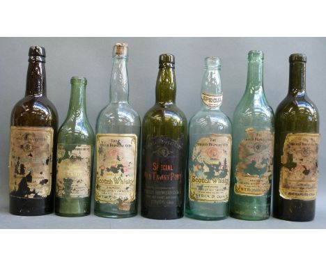 Seven Stroud Brewery Co Ltd spirit bottles including Brandy, Tawny Port, Scotch whisky x2, etc 