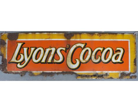 A vintage Lyon's Cocoa enamel advertising sign, 28 x 90cm