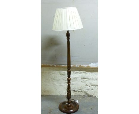 An oak standard lamp with shade, 163cm