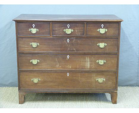 A Georgian mahogany chest of three over three graduated drawers with brass loop handles, raised on bracket feet, H101 x W125 