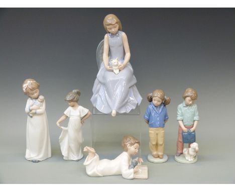 Six Nao figures including a girl with kitten, schoolgirl, schoolboy etc, tallest 28cm