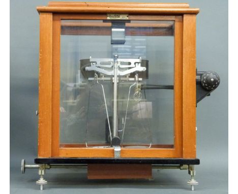A cased set of Oertling jeweller's or laboratory scales