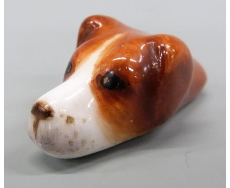 Royal Worcester ceramic whistle in the form of a hound, puce mark to base