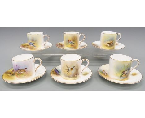 Six Royal Worcester coffee cans and saucers hand decorated with birds, all signed