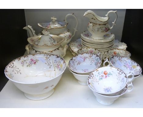 A 19thC Rockingham part tea set including teapot, sucrier and milk jug, 22 pieces in total