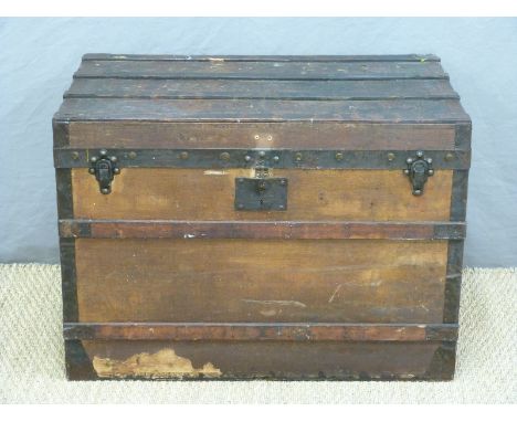 A late 19thC /20thC Louis Vuitton ash and metal bound steamer trunk with monogrammmed drop handles, studs and clasps, and wit