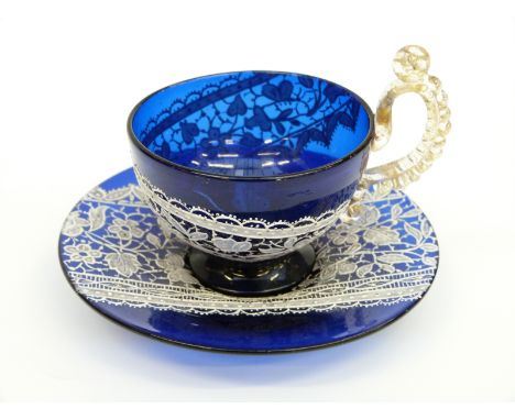 Bohemian cobalt blue glass cup and saucer with enamel lace decoration and applied aventurine speckled glass handle, indistinc