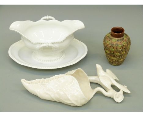 A collection of ceramics to include a Royal Worcester blanc de chine wall pocket, stoneware vase with gilt ground and Rosenth