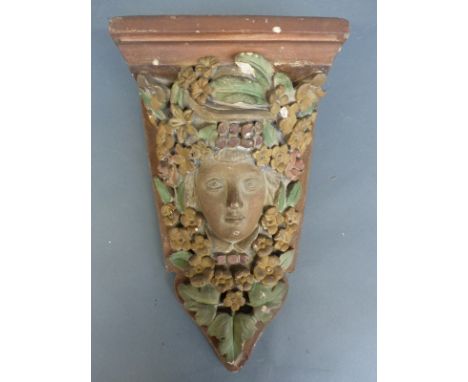 A cast plaster figural pier or wall bracket, height 32cm