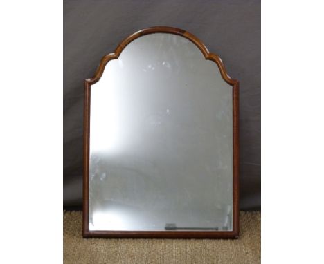 A 19thC shaped easel backed walnut mirror, H62cm