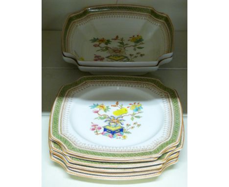 A Royal Worcester dessert service of two shaped dishes and six plates decorated with enamels in the Oriental manner