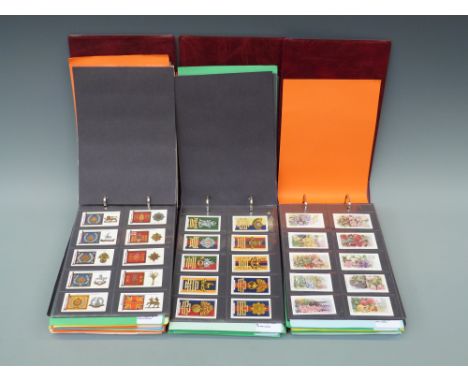 A collection of cigarette cards in three albums, includes Ardath, Churchman, Cope, Gallaher, Lambert and Butler, and Players,