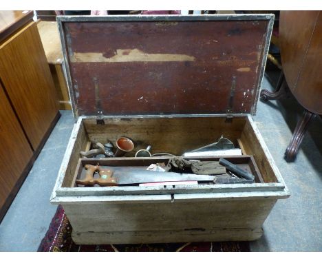 A 19thC stained / painted pine chest containing a variety of tools and collectables including cut throat razors, bugle, plate