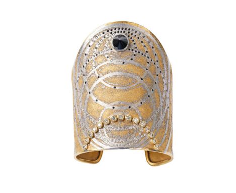 Michael Zobel (Tanger/ Marokko 1942). Außergewöhnllicher Armreif mit schwarzem Diamant und Fancy-Diamanten. 18 kt. GG und WG,