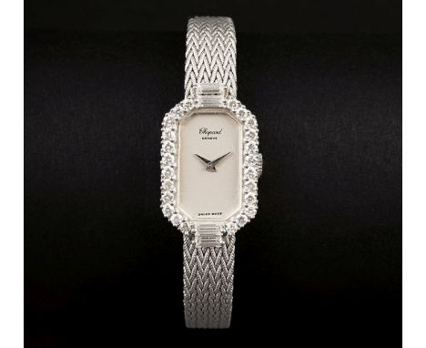 Chopard. Damenarmbanduhr mit Diamanten. Wohl um 1975. 18 kt. WG gest., Diamanten, Handaufzug. Weißgoldenes Zifferblatt, bez. 