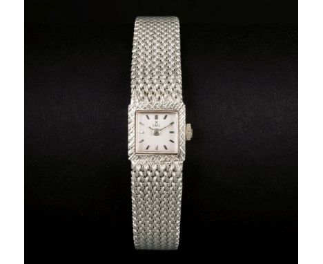 Ebel. Vintage Damenarmbanduhr. Wohl um 1970. 18 kt. WG gest., Handaufzug. Silbernes Zifferblatt m. silbernen Indizes, bez. EB