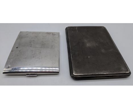 A Cartier silver cigarette case, gilt interior, 9.5cm x 7cm together with an early 20th century silver cigarette case, engine